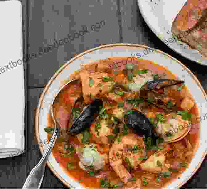A Spread Of Provençal Cuisine, Including Bouillabaisse, Ratatouille, And Pissaladière. Curious Histories Of Provence: Tales From The South Of France