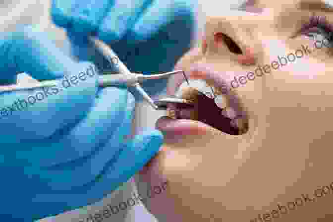 Dentist Examining A Patient's Teeth During A Dental Checkup Contemporary Oral Oncology: Rehabilitation And Supportive Care
