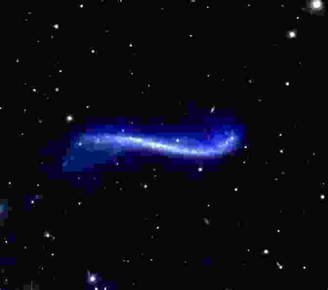 Distinctive Shape Of A Tau Warped Galaxy, Showing Its Twisted And Elongated Form With Vibrant Hues Of Stars And Gas Secrets Of The Tau (Warped Galaxies 3)